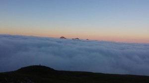 Cima del Monte Alben tra le nuvole vista dal Rifugio Capanna 2000